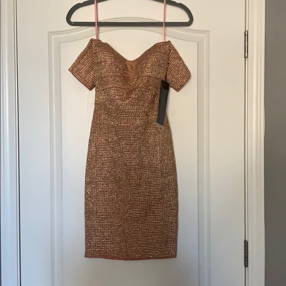 Gold midi dress with blush trim.